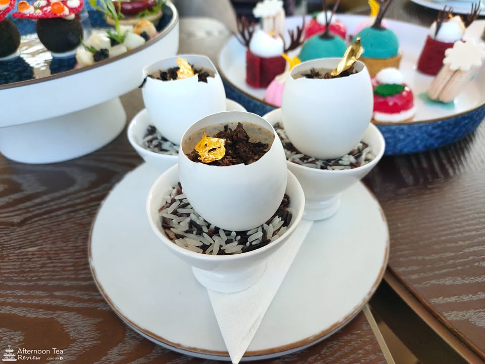 Signature truffle egg; my favourite savory. You'll get one each, these are for 3 people.